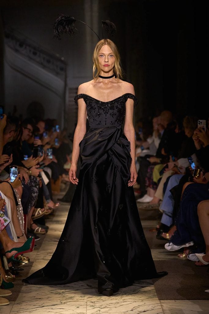 Elie Saab Fall 2025 Haute Couture off-the-shoulder embellished gown on the runway.