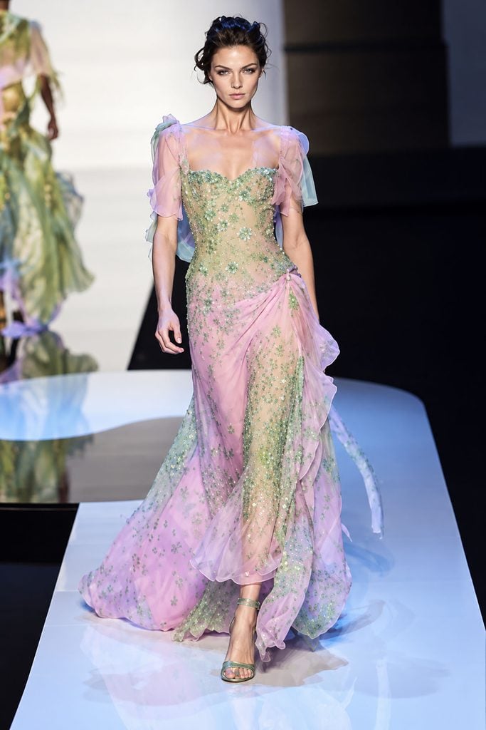 Elie Saab Spring 2004 Haute Couture pink gown with green floral embroidery and a sweeping train on the runway.