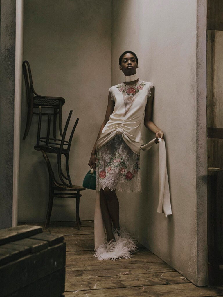 Erdem Resort 2027 ivory satin-and-lace floral-embroidered dress shown in the collection lookbook.