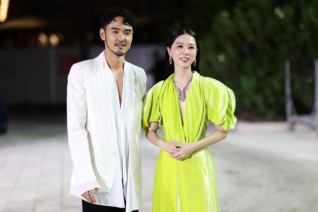 Ethan Juan wearing Maison Margiela Fall 2026 at the Arrested Memory premiere and Hsieh Ying-Xuan wearing an acid-green Maison Margiela Fall 2026 velvet gown 