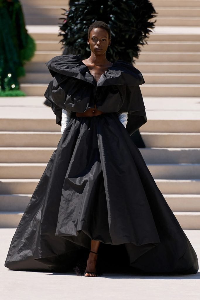 Balenciaga runway reference for Isabelle Huppert’s black leather and voluminous skirt look at TIFF