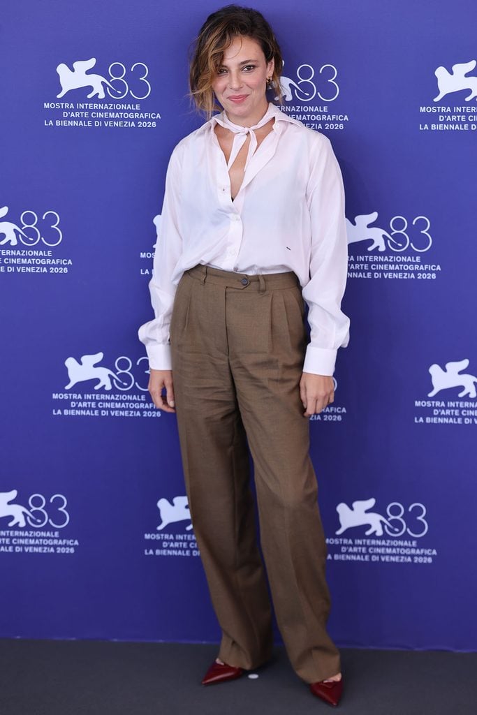Jasmine Trinca wearing Prada at the Succederà Questa Notte photocall during the 2026 Venice Film Festival.