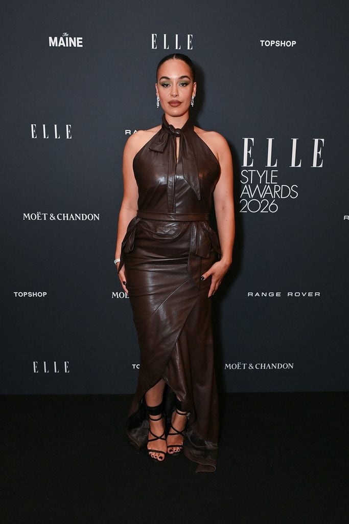 Jorja Smith wearing a chocolate-brown Nina Ricci leather halterneck dress at the 2026 ELLE Style Awards in London.