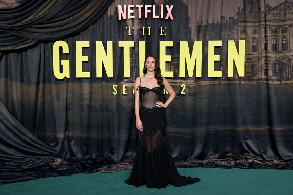 Kaya Scodelario in a black Paolo Sebastian Couture gown at The Gentlemen Season Two world premiere in London.