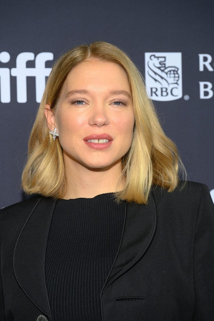 Léa Seydoux showcases her Louis Vuitton High Jewelry with her black tailored look at the Gentle Monster premiere.