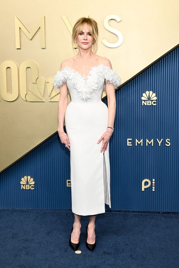 Nicole Kidman in a custom Chanel dress embellished with white silk and raffia flowers on the 2026 Emmys red carpet.