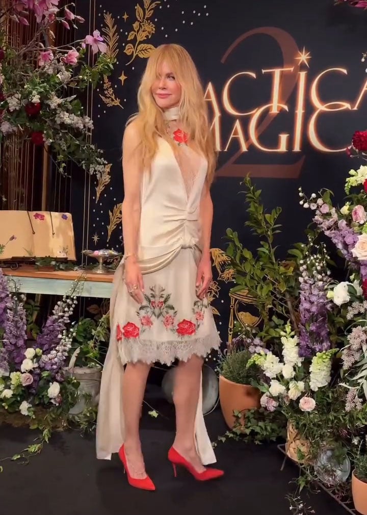 Nicole Kidman pairs her Erdem floral dress with red pumps for the Practical Magic 2 screening in Sydney.