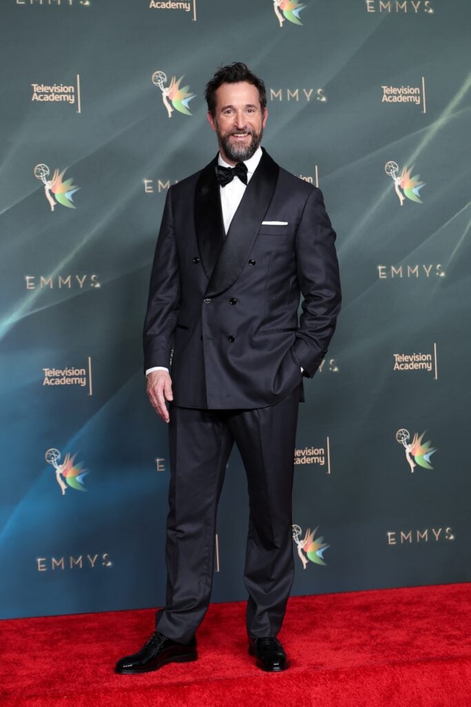 Noah Wyle wearing a custom Brunello Cucinelli double-breasted tuxedo at the 2026 Creative Arts Emmy Awards.