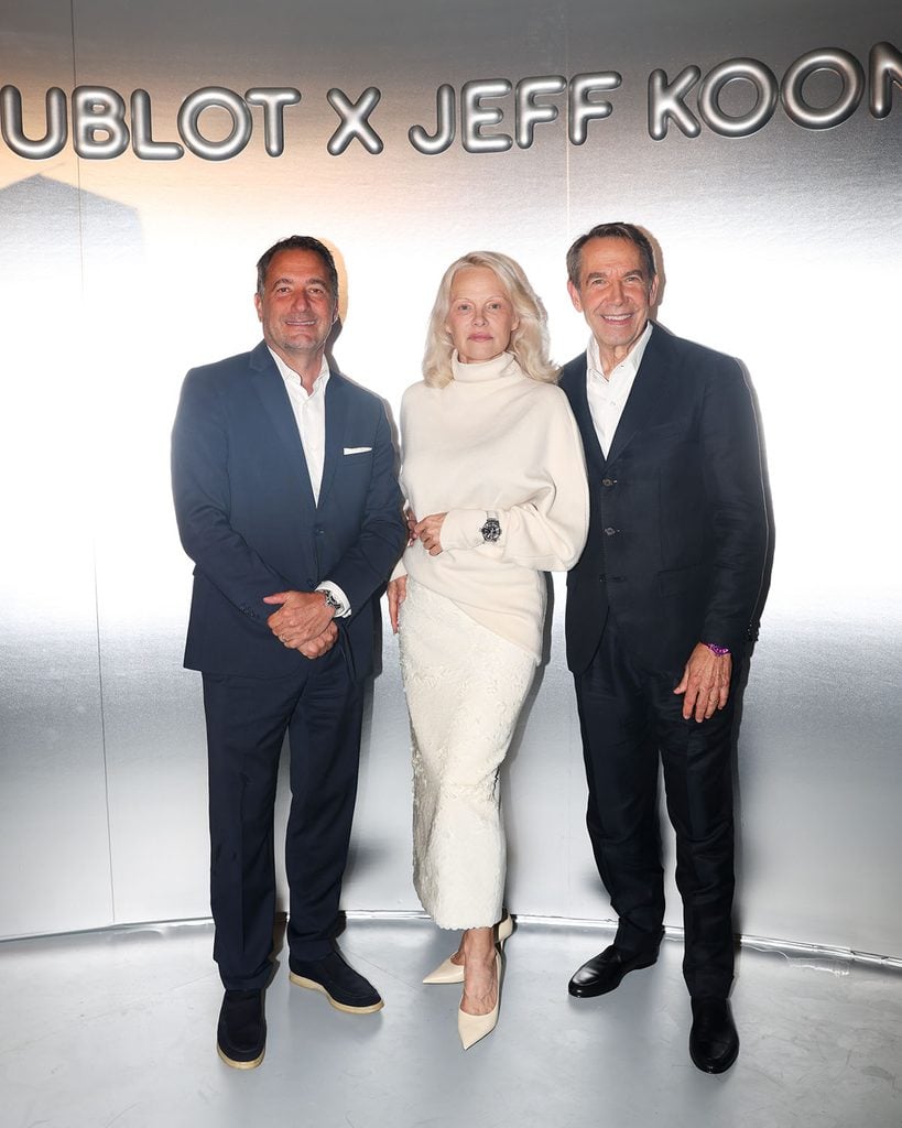 Pamela Anderson attending the Hublot x Jeff Koons event in New York with Julien Tornare and Jeff Koons