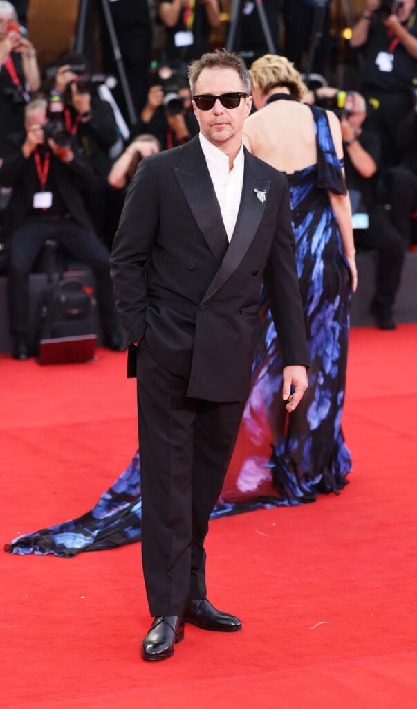 Sam Rockwell wearing a black Zegna double-breasted suit at the Wild Horse Nine premiere during the Venice Film Festival.