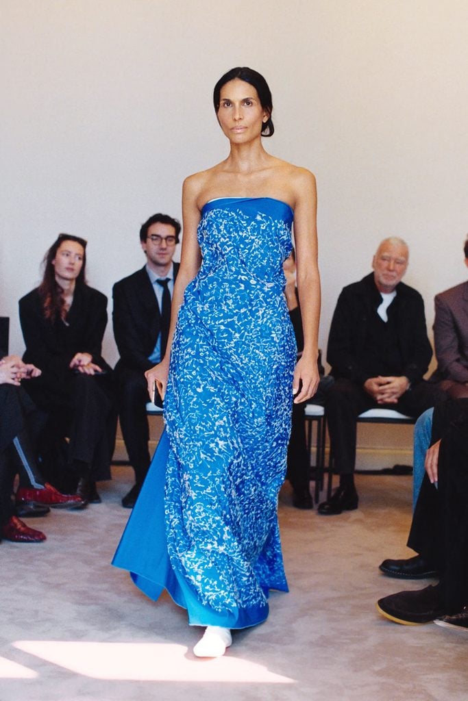 Blue-and-white floral-embroidered column dress with an oversized bow from The Row Resort 2027 collection.