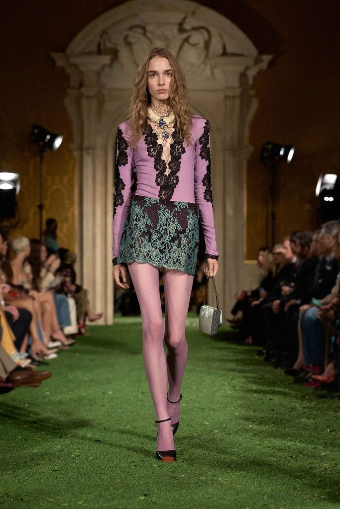Valentino lilac lace-trim bodysuit and turquoise lace shorts from the collection.