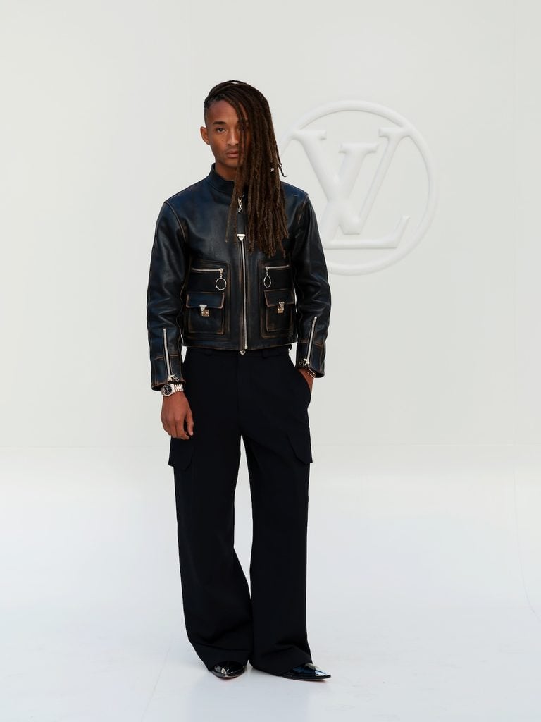 Jaden Smith wearing a black Louis Vuitton leather jacket and trousers at the Spring-Summer 2027 show in Paris.
