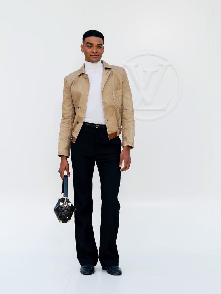 Owen Thiele wearing a cropped tan Louis Vuitton jacket at the Women’s Spring-Summer 2027 show in Paris.