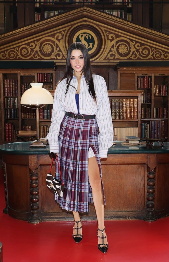 Hande Erçel wearing Valentino plaid at the Valentino Spring 2027 show in Paris.
