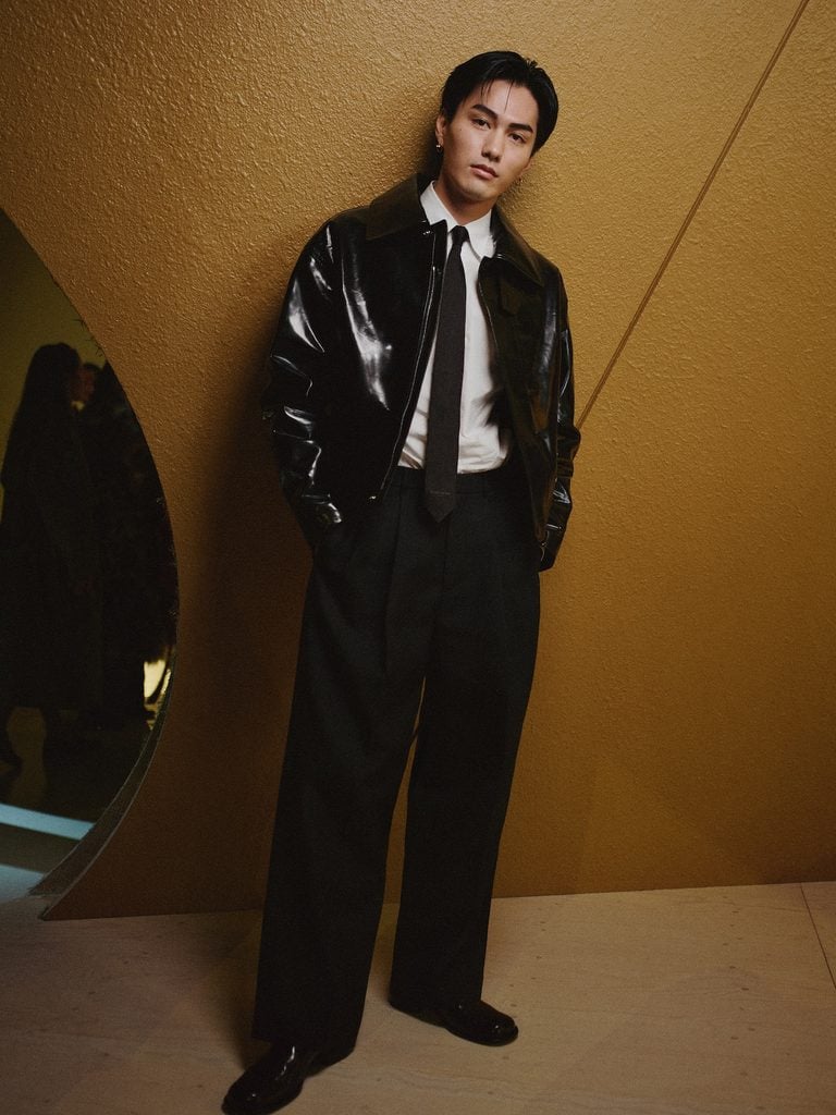 Shuzo Ohira wearing a black Givenchy leather jacket with a white shirt and tie at the Givenchy Spring 2027 show in Paris.