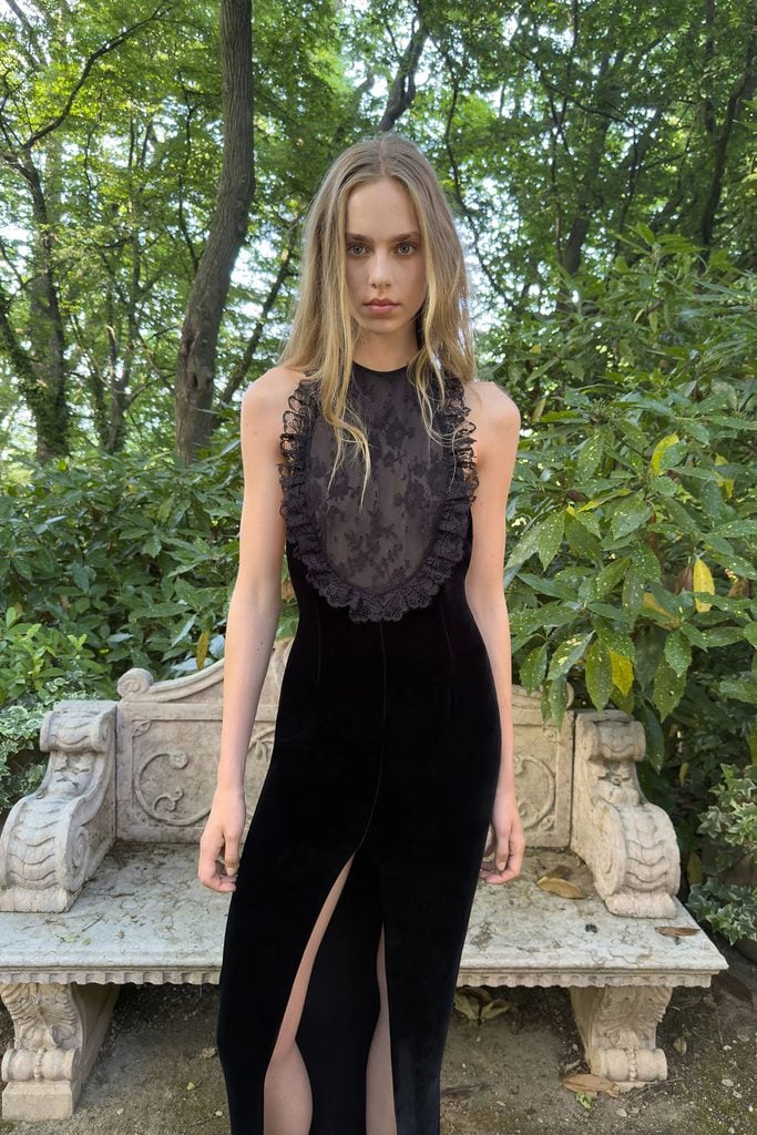 Alessandra Rich Spring 2027 runway look featuring a sheer lace ruffled bodice and black velvet skirt, later worn by Felicity Jones