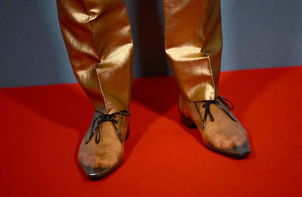 Saint Laurent Spring 2027 transparent pvc shoes worn by Alexander Skarsgård for Wicker premiere