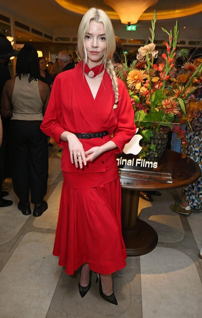 Anya Taylor-Joy in a red Lanvin Spring 2027 skirt suit at the Apple Original Films Awards Reception in London