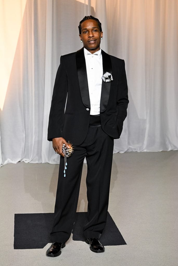 A$AP Rocky wearing a black Chanel tuxedo with statement accessories at the 2026 Academy Museum Gala