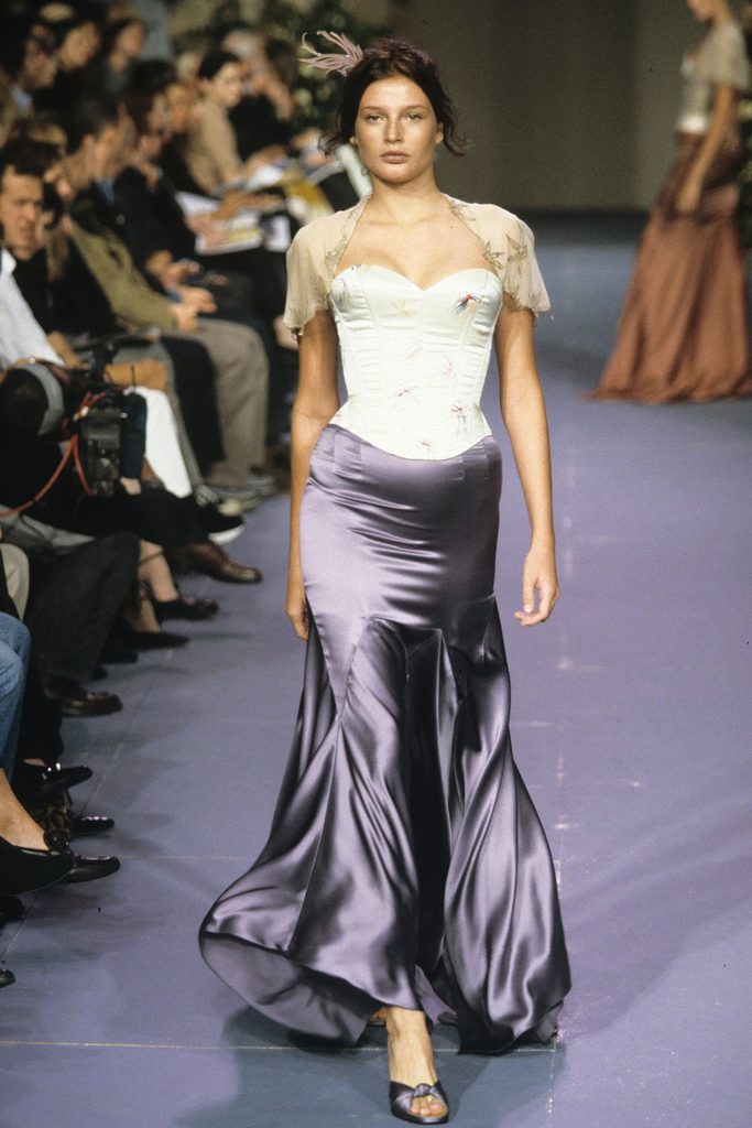 Bridget Hall modelling an ivory embroidered corset and petrol-blue satin skirt from the ChloƩ Spring 1999 ready-to-wear collection.