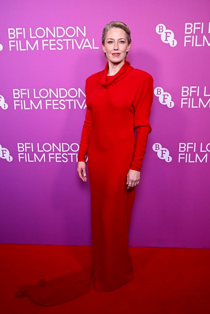 Carrie Coon wearing a red Valentino Fall 2026 gown with Repossi jewellery at 'The Liberation' premiere during the BFI London Film Festival.
