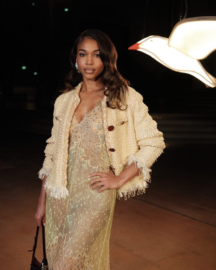 Lori Harvey front row at the Chanel Womenswear Spring 2027 show in Chanel tweed jacket and dress