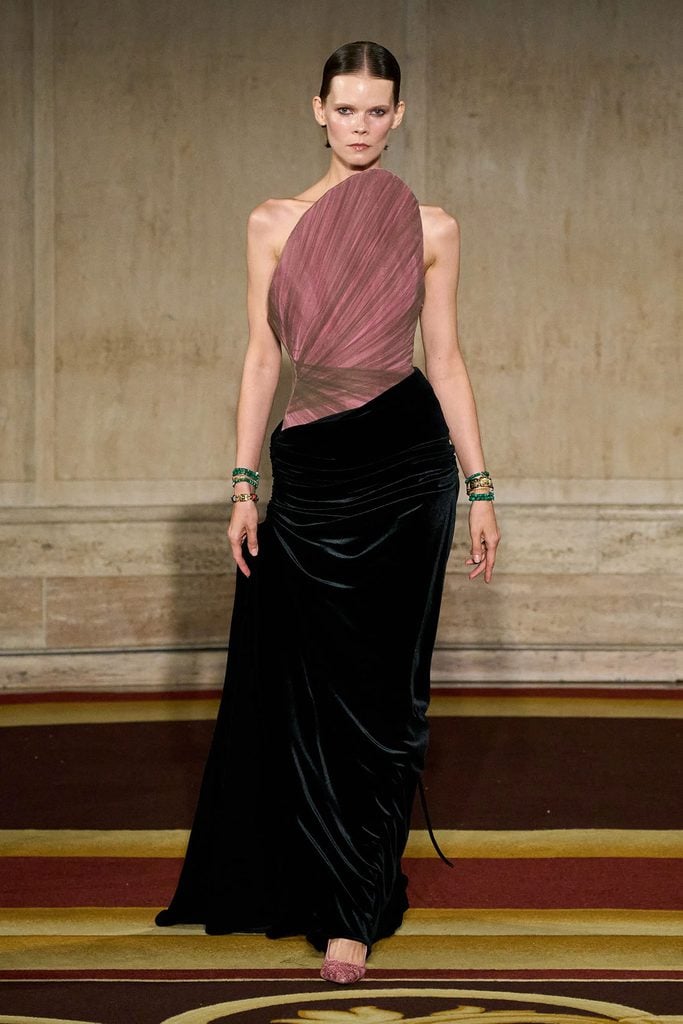 Christian Siriano Spring 2027 gown with a sculptural dusty-pink bodice and black velvet skirt