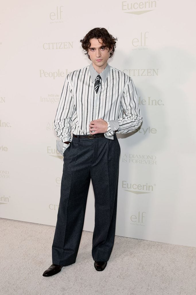 Costa D'Angelo in a striped Saint Laurent by Anthony Vaccarello look at the InStyle Imagemaker Awards