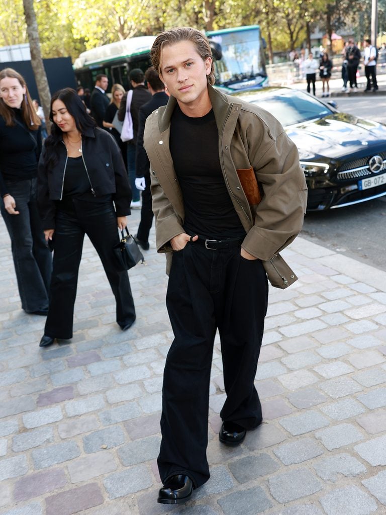 Deacon Phillippe wearing a Balenciaga jacket with black trousers at the Spring 2027 show during Paris Fashion Week.