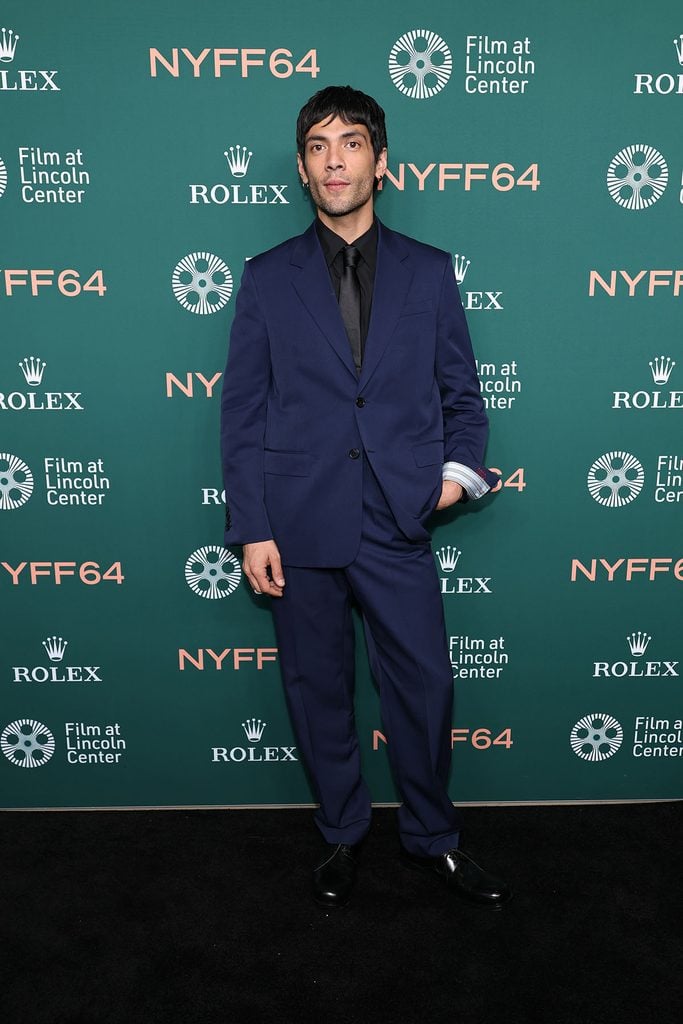 Diego Calva wearing a blue Loewe suit with a black shirt and tie at the 'Club Kid' premiere during the 2026 New York Film Festival.