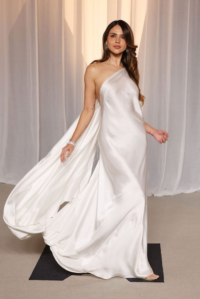 Eiza González in a white one-shoulder Ralph Lauren Spring 2026 gown with flowing drapery at the 2026 Academy Museum Gala