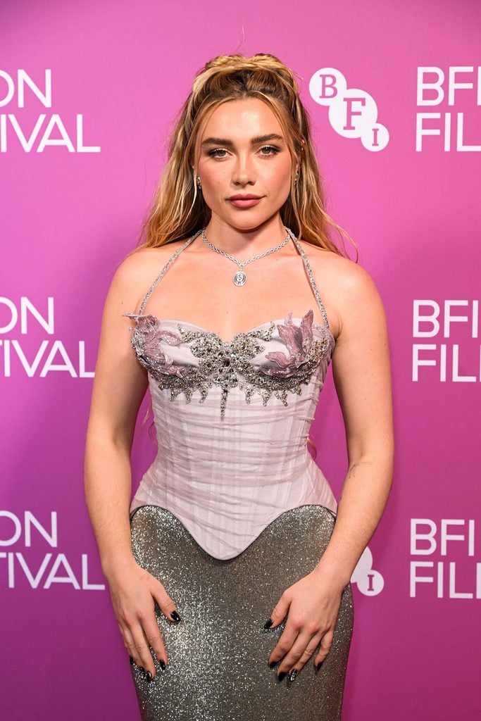 Close-up of Florence Pugh wearing an embellished lilac Wiederhoeft Spring 2027 corset and Bvlgari necklace at the 2026 BFI London Film Festival.