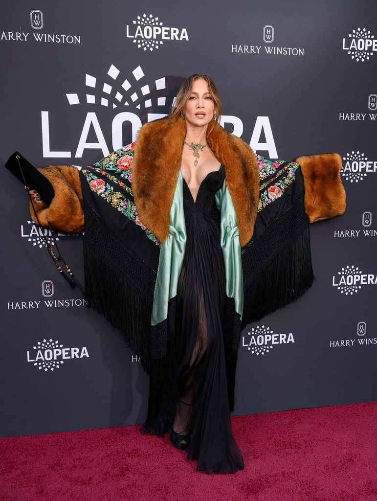 Jennifer Lopez in a black Maria Lucia Hohan gown with a dramatic Dolce & Gabbana Alta Moda coat at the LA Opera Opening Night Gala in Los Angeles.