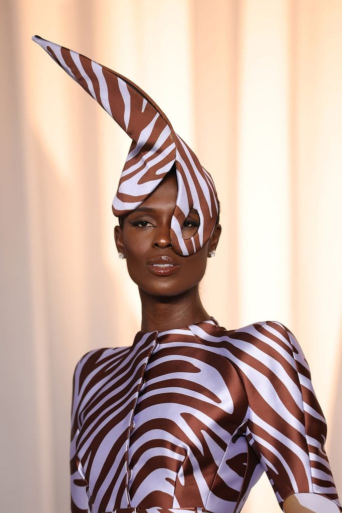 Close-up of Jodie Turner-Smith's Mugler zebra-print headpiece and sculpted shoulders at the 2026 Academy Museum Gala