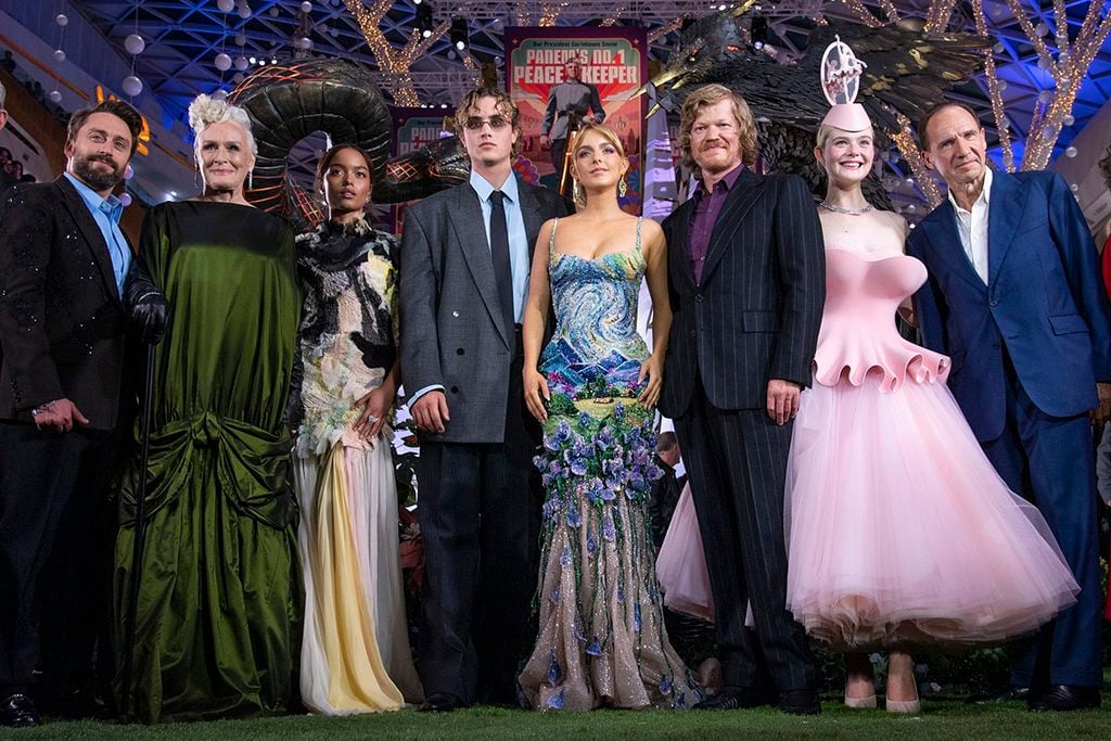 Joseph Zada in Gucci joins Glenn Close, Whitney Peak, McKenna Grace, Elle Fanning and fellow cast members at The Hunger Games: Sunrise on the Reaping premiere.