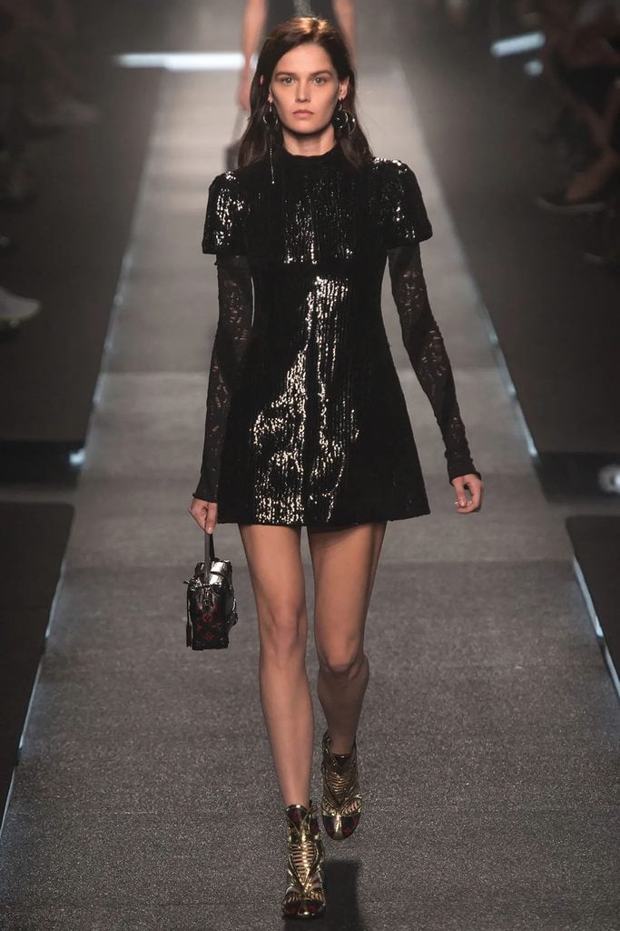 Louis Vuitton Spring 2015 runway model wearing the black sequinned mini dress later selected by Ana de Armas.