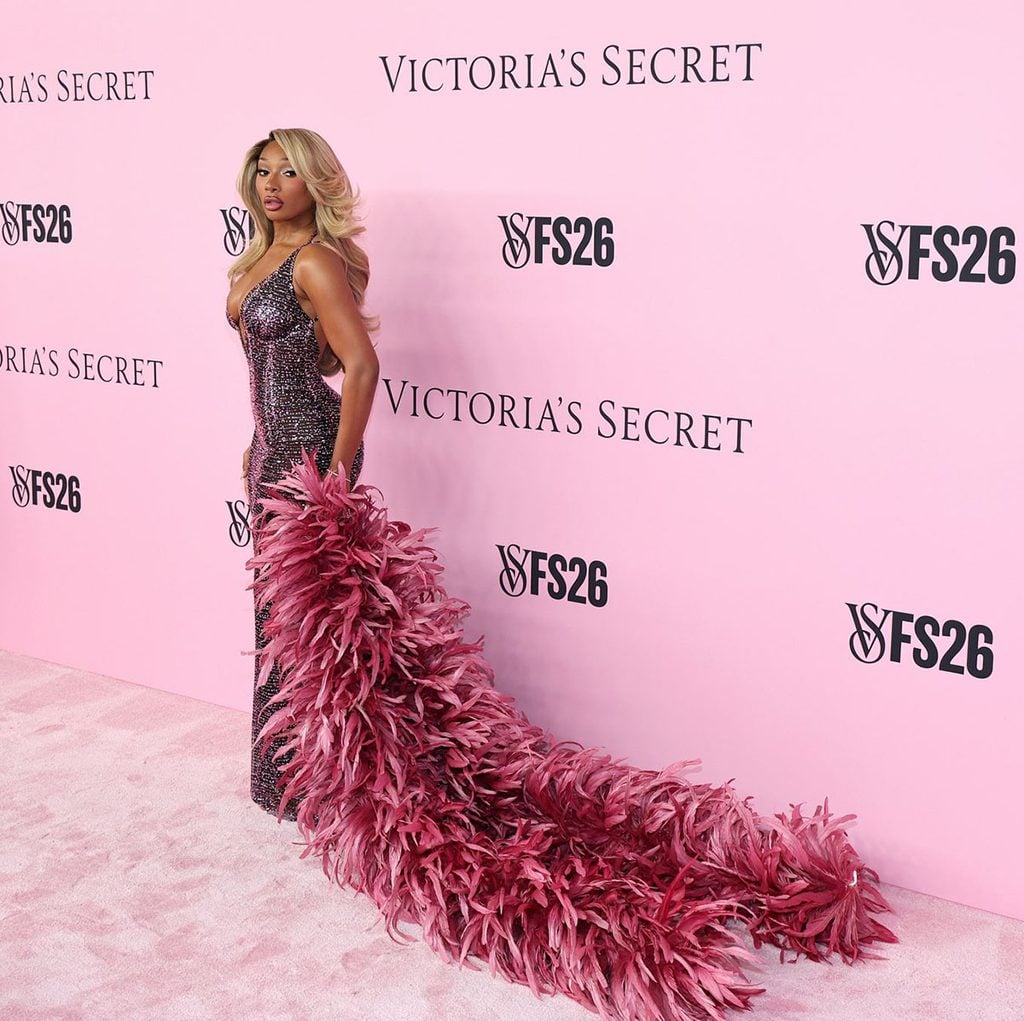 Megan Thee Stallion's blonde waves and pink crystal Walter Mendez gown at the 2026 Victoria's Secret Fashion Show.