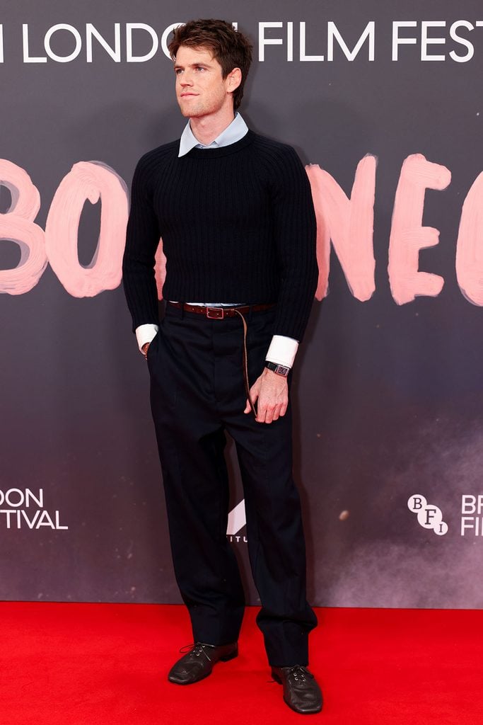 Miguel Bernardeau wearing a Loewe knit sweater, silk shirt and wool trousers at the 'La Bola Negra' BFI London Film Festival premiere.