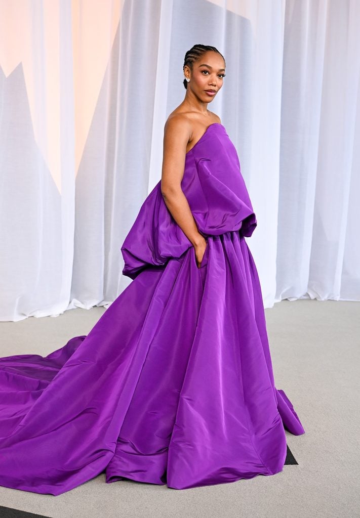 Naomi Ackie wearing a voluminous purple Balenciaga gown at the 2026 Academy Museum Gala in Los Angeles