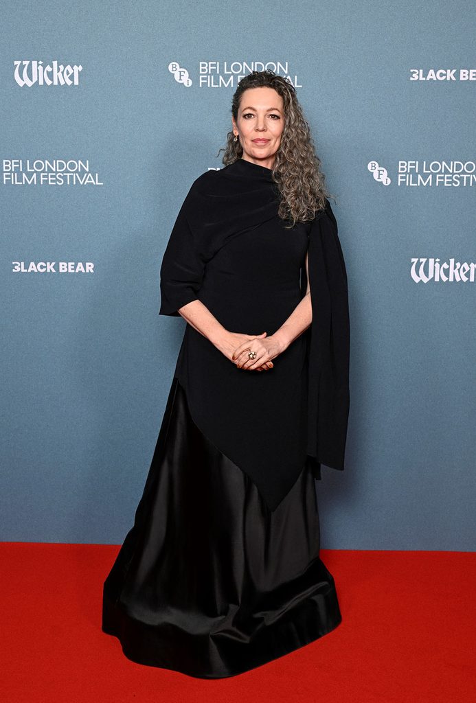 Olivia Colman wearing a black Celine gown with asymmetrical draping and a full-length satin skirt at the Wicker screening during the BFI London Film Festival.