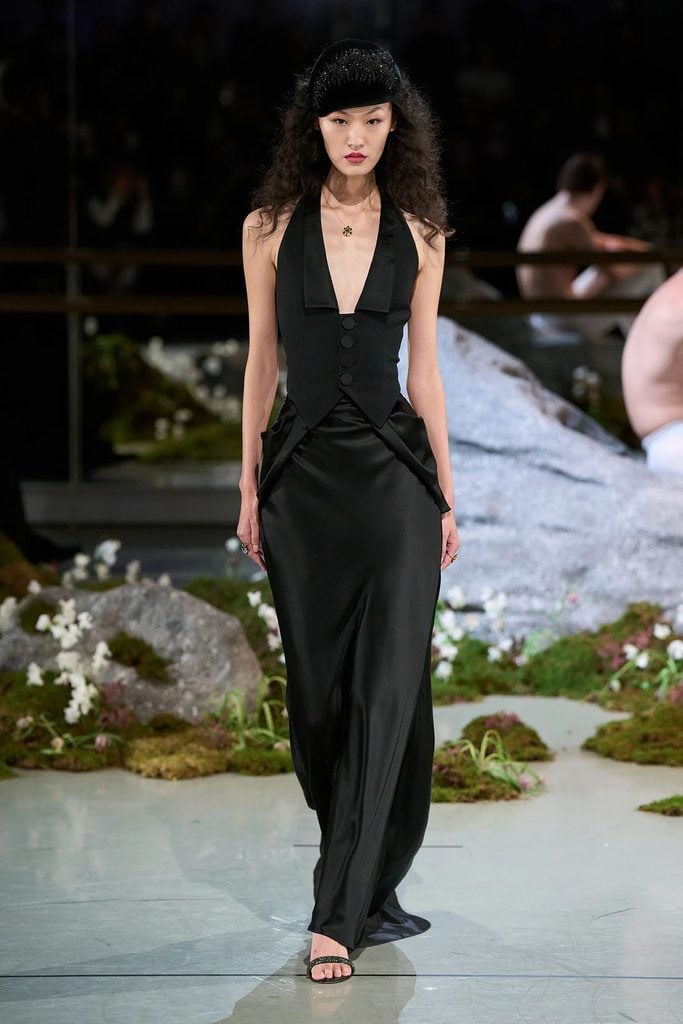Model wearing the black waistcoat and satin skirt from the Patrick McDowell Fall 2026 collection.