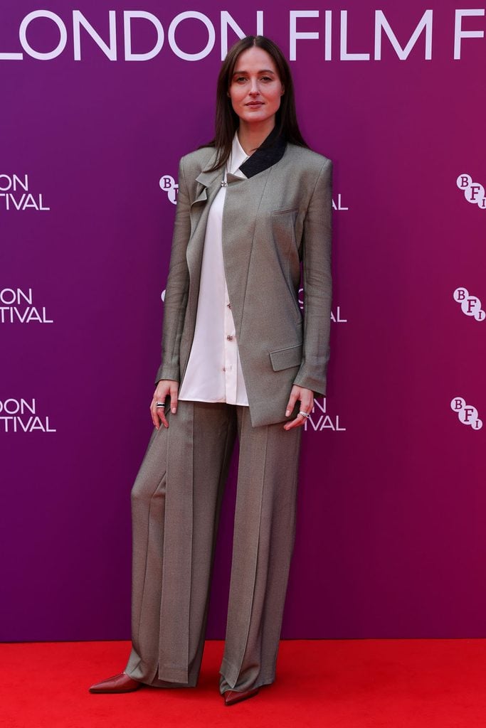 Renate Reinsve in a Louis Vuitton Spring 2027 grey tailored suit with asymmetric detailing at the BFI London Film Festival for Fjord.