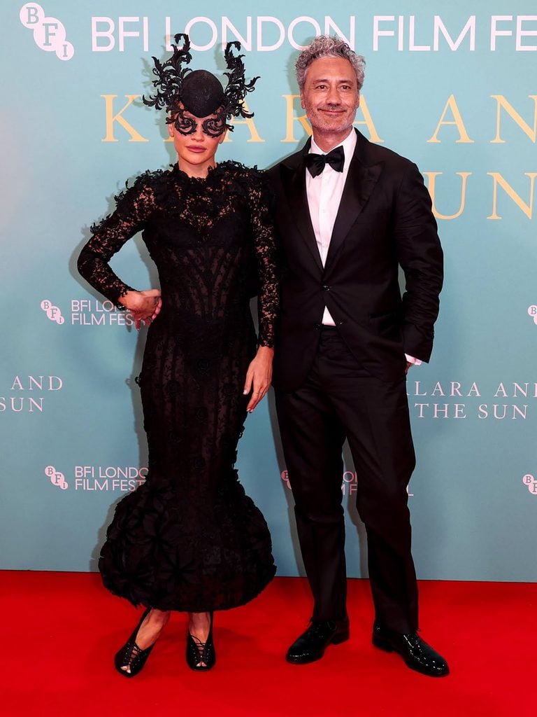 Rita Ora in ArdAzAei Fall 2026 Couture with a Philip Treacy headpiece alongside Taika Waititi at the 'Klara and the Sun' BFI London Film Festival premiere