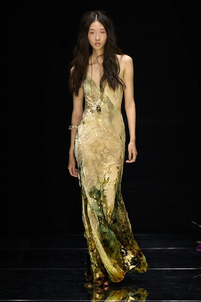 Roberto Cavalli Spring 2027 runway model wearing the devoré velvet slip dress with a painterly floral print and gold pigment detailing.