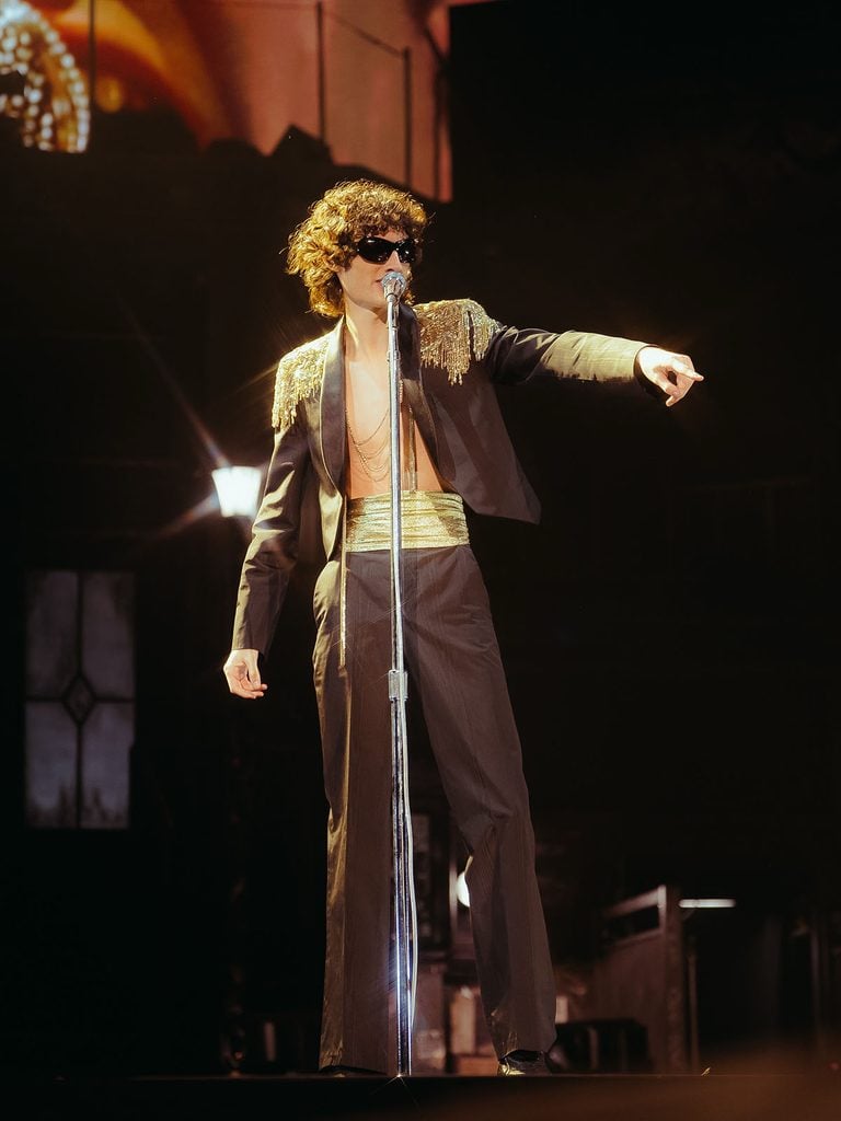 Sombr performing in Los Angeles on the 'You Are the Reason' tour wearing custom Valentino by Alessandro Michele with gold-fringed shoulders