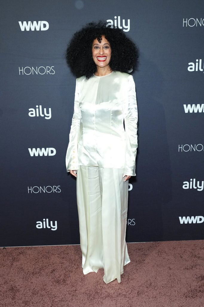 Tracee Ellis Ross wears an ivory Celine Fall 2026 satin ensemble with wide-leg trousers at the 2026 WWD Honors in New York.