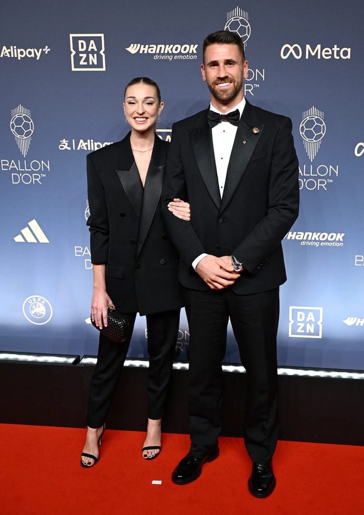 Unai Simón wearing a black Dolce & Gabbana tuxedo with satin lapels and a bow tie at the 2026 Ballon d'Or Awards.