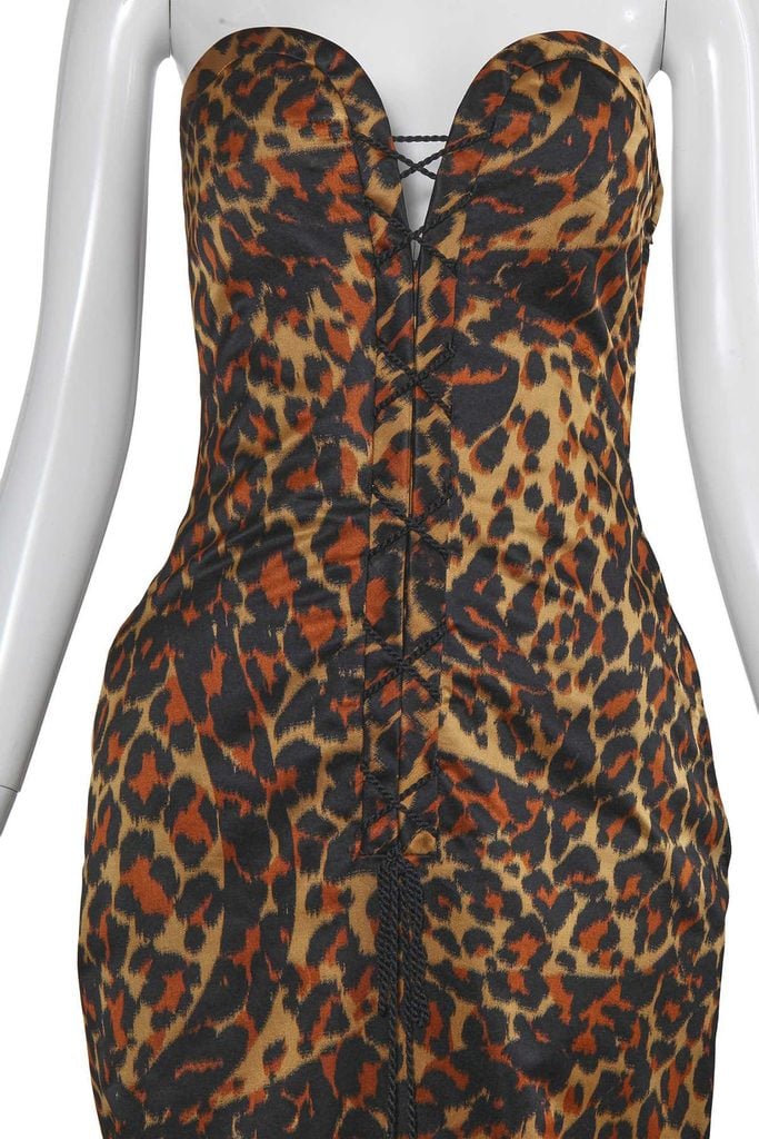 Close-up of the lace-up corset, sweetheart neckline and leopard-print fabric on the Yves Saint Laurent Golden Tigress gown listed at Kerry Taylor Auctions.
